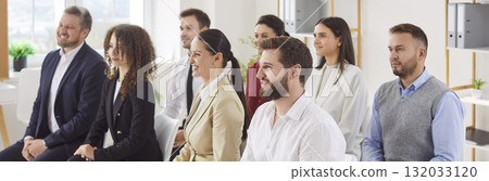 Business Group Participating In Office Conference Or Presentation Business Group Participating In Office Conference Or Presentation 132033120