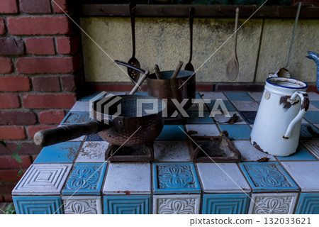 A retro cooking space with striking blue tiles 132033621