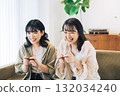 Female friends playing games 132034240