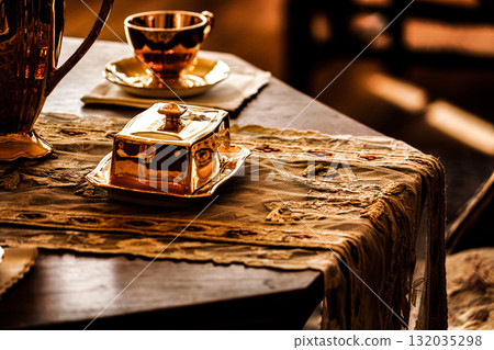 Image of gold cutlery 132035298
