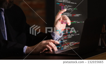 Trendy collage. Professional programmer working with transparent digital display in dark environment Trendy collage. Professional programmer working with transparent digital display in dark environment 132035665