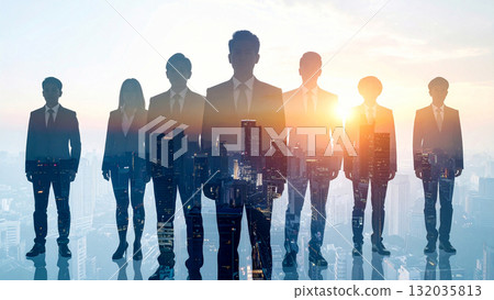 Silhouettes of business people gathered for an interview or meeting in an urban office building shining in the morning sun, symbolizing hope and cooperation 132035813