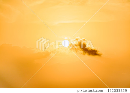 Beautiful orange sunrise sky over the sea horizon. Summer golden hour. 132035859