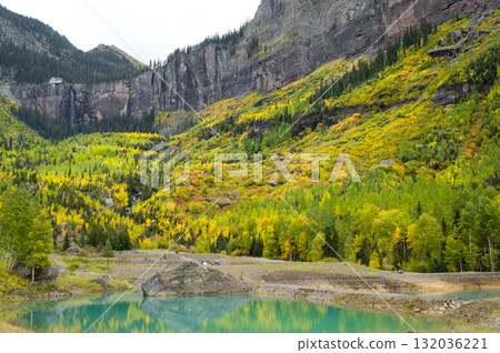 Emerald pond near Bridal veil trail with stunning view during fall foliage in Telluride, Colorado 132036221