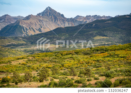 San Juan Mountains scenic view in early fall. Beautiful scenery of Mount Sneffels from Dallas Divide San Juan Mountains scenic view in early fall. Beautiful scenery of Mount Sneffels from Dallas Divide 132036247