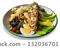 Mixed cereals salad with boiled eggs, pickled olives, avocado, various green leaves and roasted salmon isolated on white background. 132036701