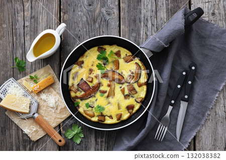 tasty porcini mushroom parmesan omelette, top view tasty porcini mushroom parmesan omelette, top view 132038382