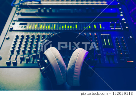 headphone on audio mixer in home studio 132039118