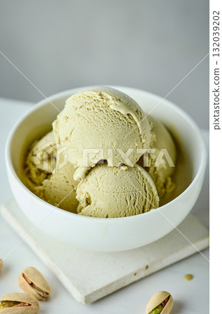 bowl of pistachio ice cream 132039202