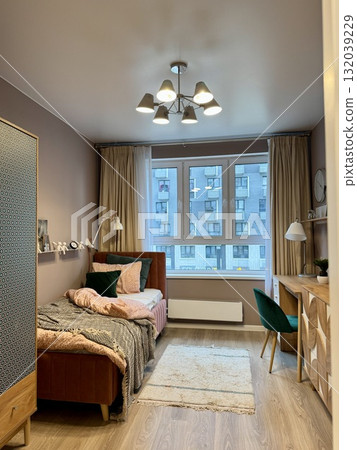 a modern bedroom in a stylish interior of a new apartment with designer renovation. High quality photo 132039229