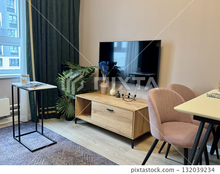 modern living room in a stylish interior of a new apartment with designer renovation. High quality photo 132039234