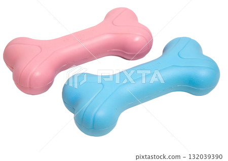Pink and blue rubber bone-shaped dog chew toys, pet supply product shot isolated on transparent background 132039390