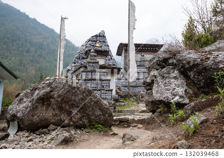 Rocks painted with prayers along EBC trek, Nepal 132039468