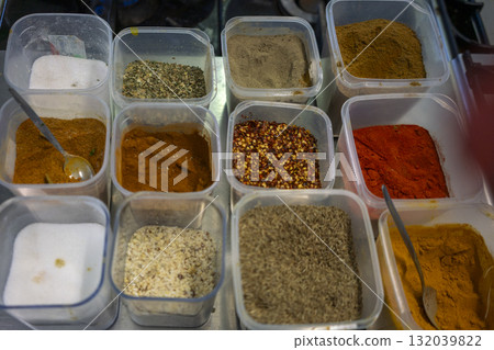Colorful spices and ingredients waiting to be used in indian restaurant Colorful spices and ingredients waiting to be used in indian restaurant 132039822
