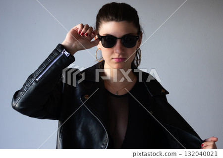 Half-length portrait of caucasian youn woman in urban style, perfect for fashion campaigns 132040021