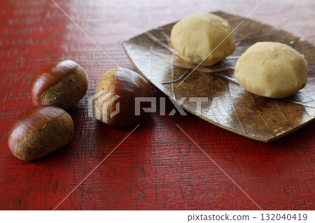 Kuri-kinton on a plate placed on a lacquered board Kuri-kinton on a plate placed on a lacquered board 132040419