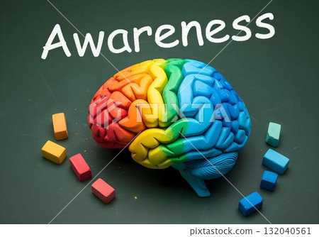 Rainbow colored brain model with cubes on green board background and chalk text awareness concept of neurodiversity autism ADHD and mental health education Rainbow colored brain model with cubes on green board background and chalk text awareness concept of neurodiversity autism ADHD and mental health education 132040561