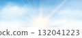 Sun rays, realistic white clouds on blue pastel sky background 132041223