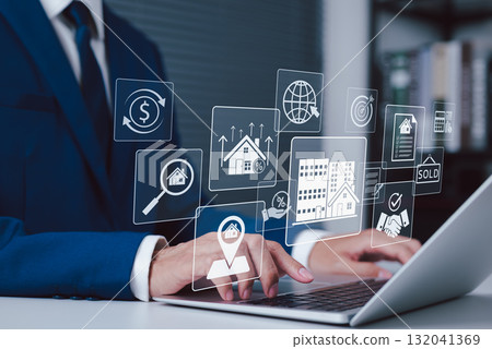 Real Estate Search and Property Investment Platform Concept. Businessman using laptop with icons for property search, investment, sales, and real estate management, buying, selling, renting properties Real Estate Search and Property Investment Platform Concept. Businessman using laptop with icons for property search, investment, sales, and real estate management, buying, selling, renting properties 132041369