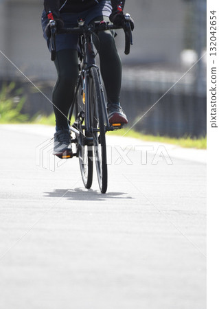 Bicycle running on the riverbed Bicycle running on the riverbed 132042654