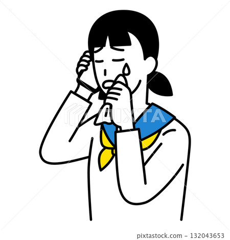 Female student crying while talking on smartphone Female student crying while talking on smartphone 132043653