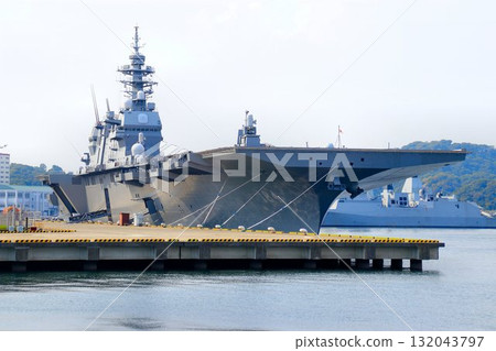 DDH destroyer Kaga docked at the Izumi quay of the Yokosuka naval port. DDH destroyer Kaga docked at the Izumi quay of the Yokosuka naval port. 132043797