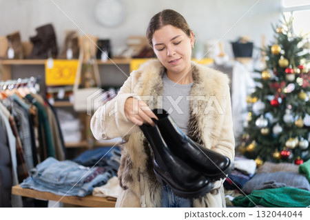 European woman chooses platform boots 132044044
