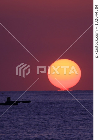 Sunset over the horizon 132044584