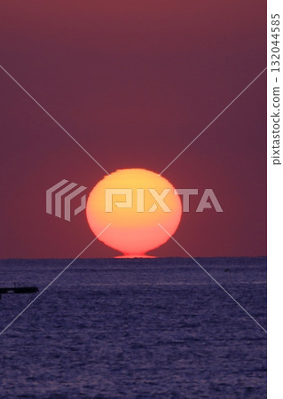 Sunset over the horizon 132044585