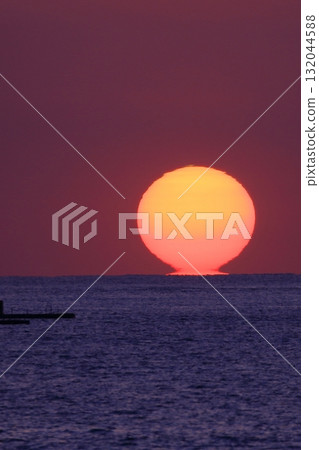 Sunset over the horizon Sunset over the horizon 132044588
