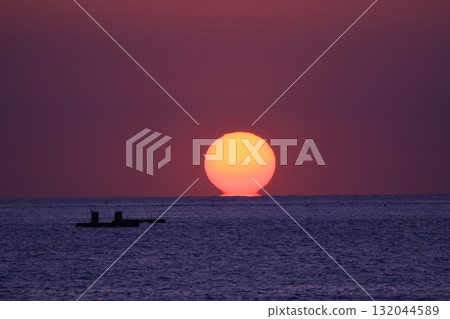 Sunset over the horizon 132044589