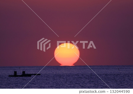 Sunset over the horizon Sunset over the horizon 132044590
