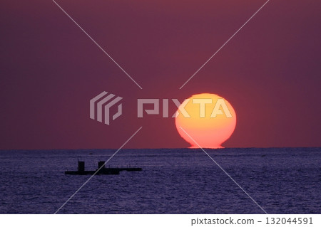 Sunset over the horizon 132044591