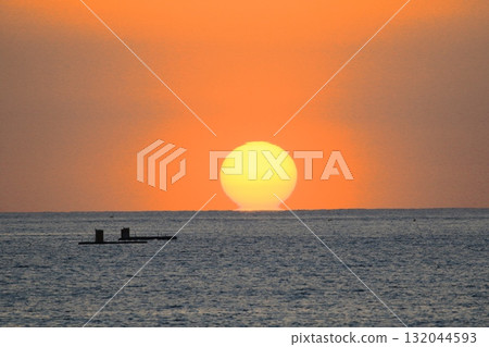 Sunset over the horizon 132044593