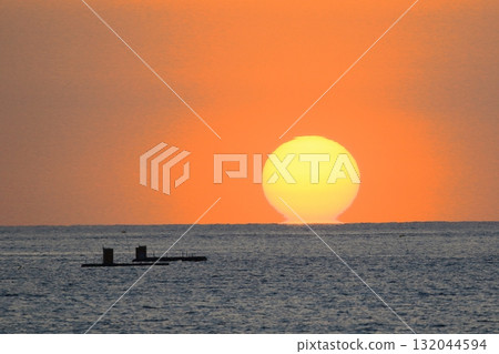 Sunset over the horizon 132044594