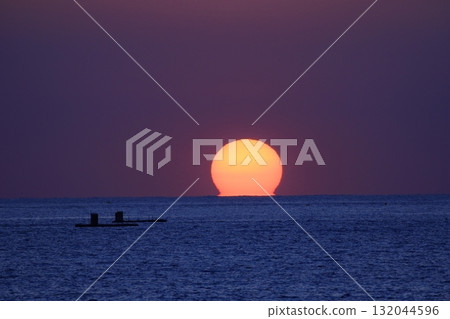 Sunset over the horizon Sunset over the horizon 132044596
