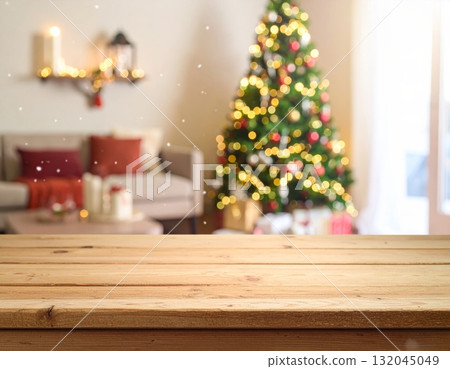Empty room interior with a Christmas tree on a wooden floor near a blank wall 132045049