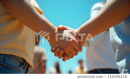 People of various backgrounds holding hands together, representing solidarity and philanthropy on International Day of Charity People of various backgrounds holding hands together, representing solidarity and philanthropy on International Day of Charity 132046210