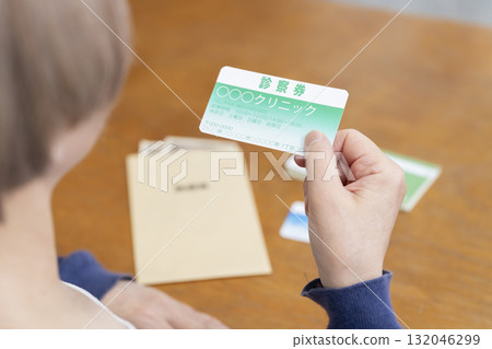A woman preparing medical expenses A woman preparing medical expenses 132046299