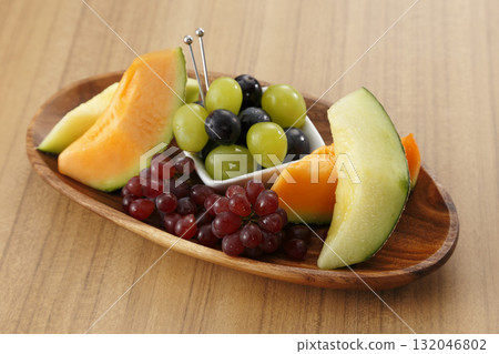 Melon and grape platter 132046802