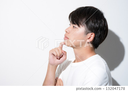 Close-up of the face of a young man in his 20s. Beauty image when considering hair removal, skin care and beauty. Close-up of the face of a young man in his 20s. Beauty image when considering hair removal, skin care and beauty. 132047178