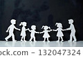 Silhouette of children holding hands, representing friendship and global unity on International Children's Day 132047324