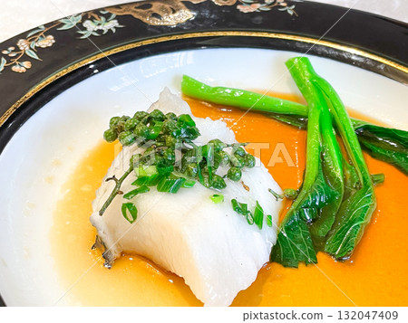 Chinese Shanghai cuisine: Steamed cod with green pepper sauce Chinese Shanghai cuisine: Steamed cod with green pepper sauce 132047409