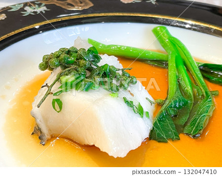 Chinese Shanghai cuisine: Steamed cod with green pepper sauce Chinese Shanghai cuisine: Steamed cod with green pepper sauce 132047410