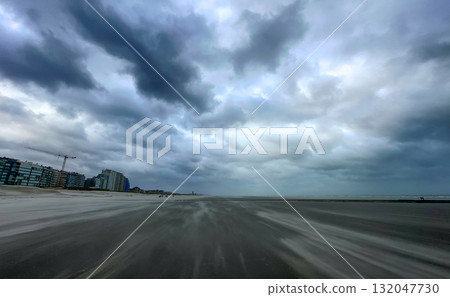 The Stormy Beach Road is accompanied by Dramatic Skies that captivate the senses 132047730