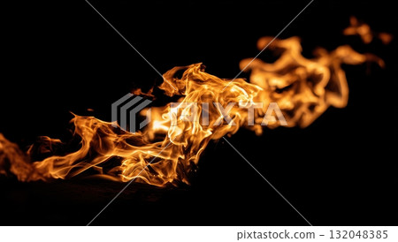 Flames dancing in the dark at a night gathering Flames dancing in the dark at a night gathering 132048385