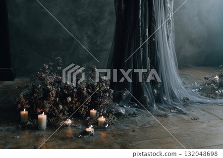 Beautiful gown with floral arrangements and candles 132048698