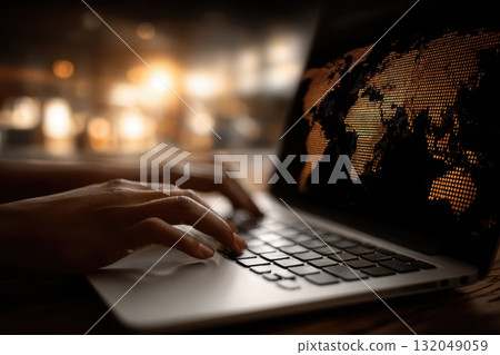 Economist analyzing international trade data on laptop Economist analyzing international trade data on laptop 132049059