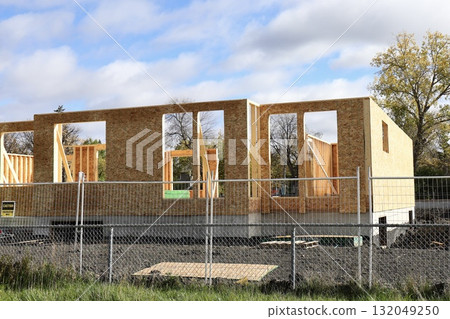 Wood frame house under construction site 132049250