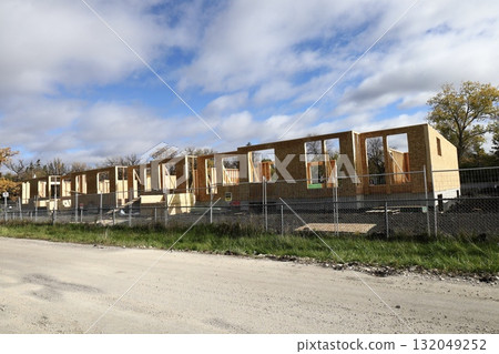 Wood frame house under construction site 132049252